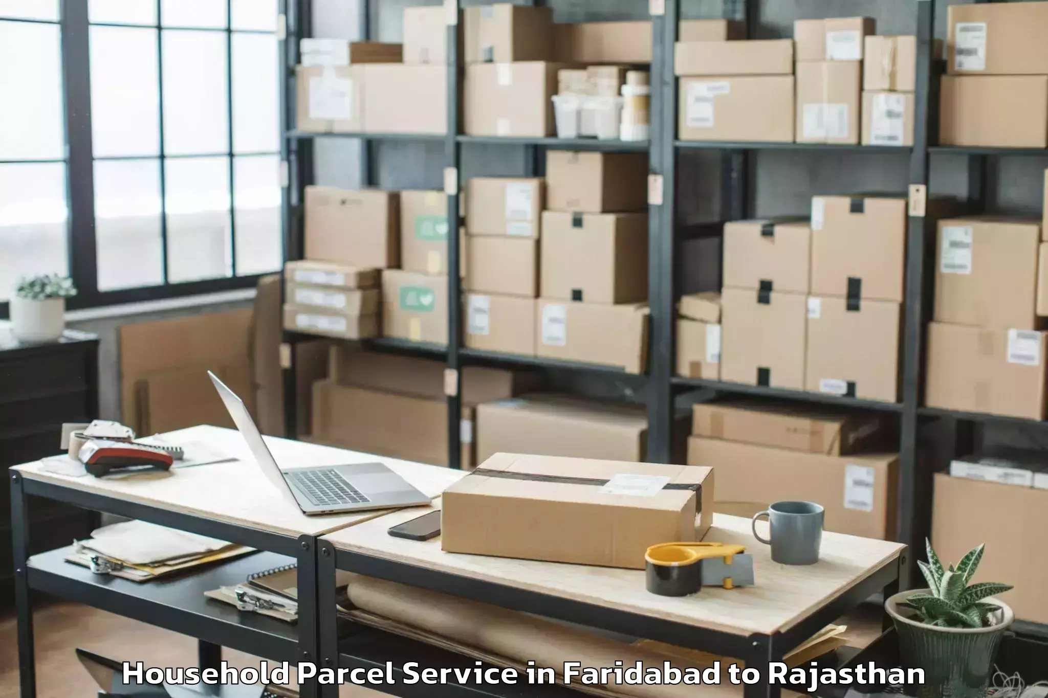 Book Faridabad to Lachhmangarh Sikar Household Parcel